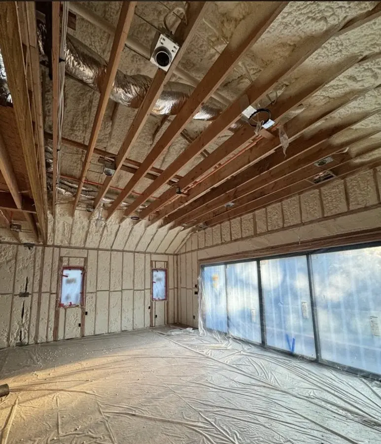 Interior walls and ceiling insulated with spray foam during new construction in Northbrook
